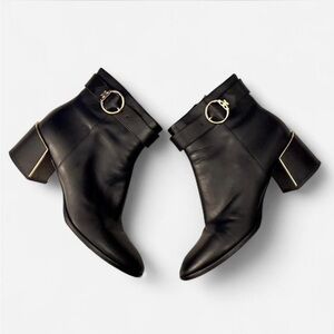 Black Tory Burch Ankle Boots with Gold Accents